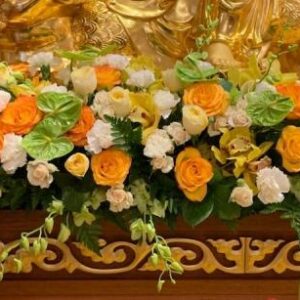 Offering Flowers in front of Buddha